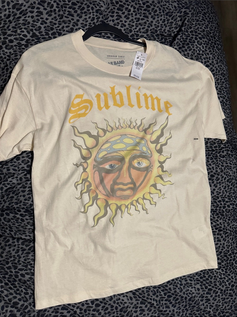 American Eagle Outfitters Cream Graphic Tee with Yellow Print oversized fit
